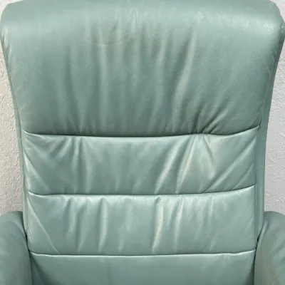 Sale Photo Thumbnail #225: Contemporary high-back recliner armchair upholstered in soft seafoam blue-green leather.