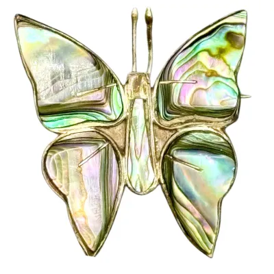 Sale Photo Thumbnail #8: Mexican sterling silver and iridescent abalone shell butterfly brooch featuring inlay detailing.
