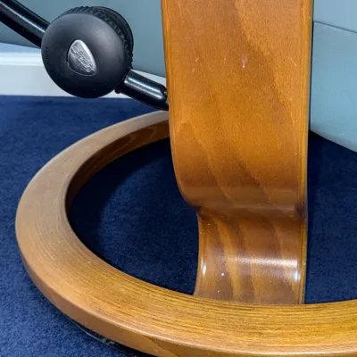 Sale Photo Thumbnail #232: Detail shot of a Stressless by Ekornes recliner base, showing the bentwood ring frame and tension adjustment knob.