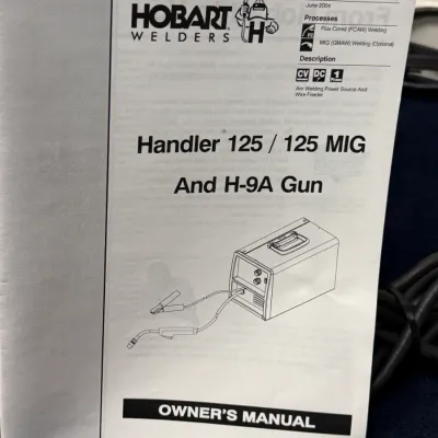 Sale Photo Thumbnail #497: Original Hobart Welders owner's manual for the Handler 125 / 125 MIG and H-9A Gun, dated June 2004.