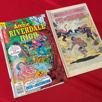 Sale Photo Thumbnail #746: Two vintage Archie at Riverdale High comic books, including issue #58 from October 1978, showing visible edge wear and spine creasing.
