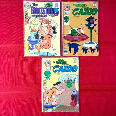 Sale Photo Thumbnail #82: Trio of vintage Charlton Comics featuring The Flintstones and The Great Gazoo, bagged and boarded.