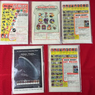 Sale Photo Thumbnail #756: Group of five vintage comic books in protective plastic sleeves, featuring back-cover advertisements including Star Trek: The Motion Picture and American Seeds Co.