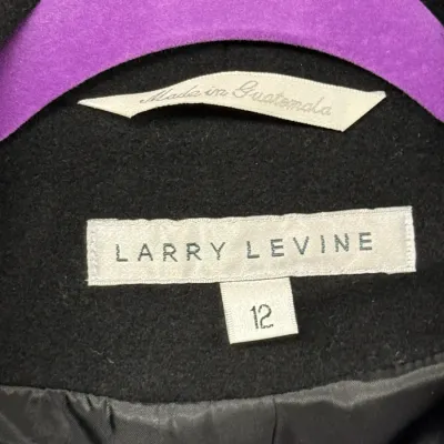 Sale Photo Thumbnail #858: Larry Levine black coat in size 12, featuring a woven brand tag and 'Made in Guatemala' label.