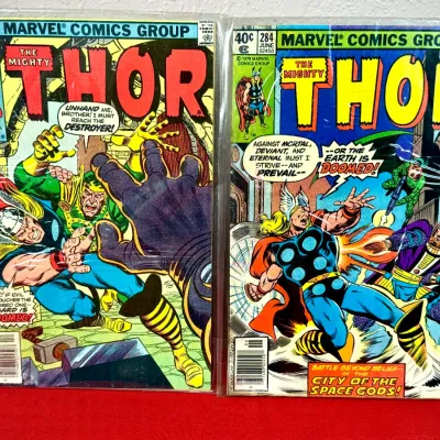 Sale Photo Thumbnail #792: Pair of vintage Marvel Comics Group The Mighty Thor comic books, including issue #266 (December 1977) and issue #284 (June 1979), both bagged for protection.