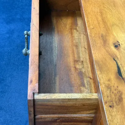 Sale Photo Thumbnail #251: Open wooden drawer showing rich natural wood grain construction and metal hardware.