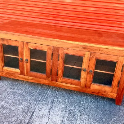 Sale Photo Thumbnail #311: Rustic solid wood low console sideboard featuring four glass-paned cabinet doors with ring pull hardware.