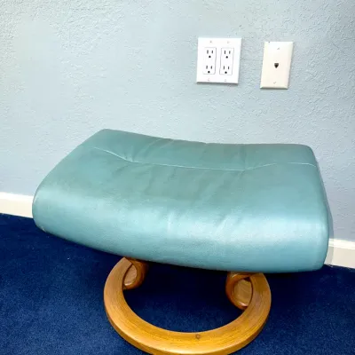 Sale Photo Thumbnail #238: Ekornes Stressless-style ottoman featuring teal leather upholstery and a bentwood circular base.