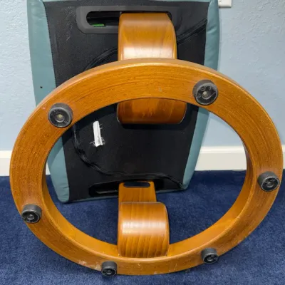 Sale Photo Thumbnail #241: Underside view of a Stressless-style teal leather ottoman showing the bentwood circular base and rubber feet.