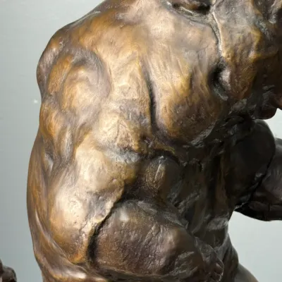 Sale Photo Thumbnail #121: Close-up detail of a bronzed animal sculpture showing muscular texture and a rich patinated finish.