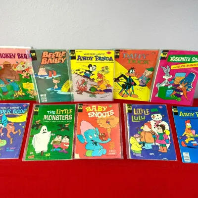 Sale Photo Thumbnail #88: Collection of ten vintage children's comic books from the 1970s and 1980s, including titles like Smokey Bear, Beetle Bailey, Daffy Duck, and Little Lulu.