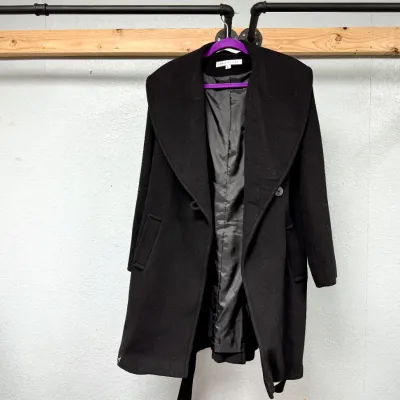 Sale Photo Thumbnail #92: Black Lafayette 148 New York double-breasted coat featuring a wide shawl collar, full lining, and side pockets.