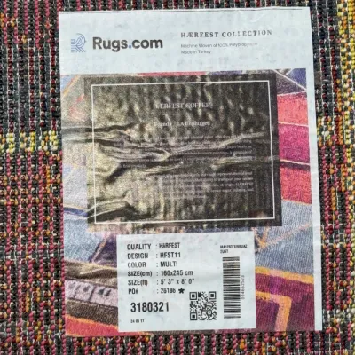 Sale Photo Thumbnail #731: Rugs.com Hærfest collection area rug tag showing 5'3" x 8'0" dimensions and multi-color Turkish weave details.