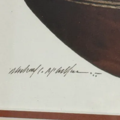 Sale Photo Thumbnail #481: Close-up detail of an artist's signature on a framed piece of artwork.