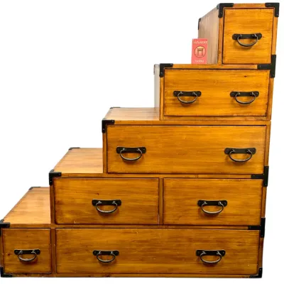 Sale Photo Thumbnail #11: Japanese Kaidan Tansu step chest featuring natural wood finish, metal corner accents, and iron bail handles.