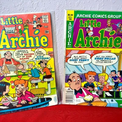 Sale Photo Thumbnail #744: Two vintage Little Archie comic books, including issue #108 from July 1976 and issue #168, both protected in plastic sleeves.