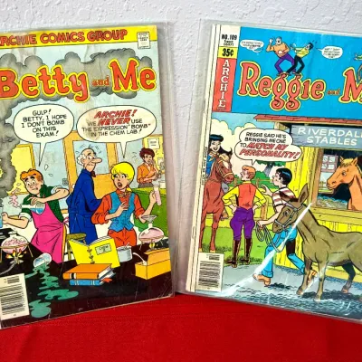 Sale Photo Thumbnail #758: Two vintage Archie Series comic books in protective sleeves, including Betty and Me #99 and Reggie and Me #109, both from the late 1970s.