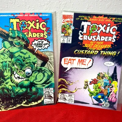 Sale Photo Thumbnail #764: Pair of Marvel Comics Toxic Crusaders comic books, issues #2 and #3 from 1992, each presented in protective plastic sleeves.