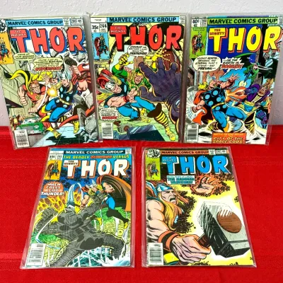 Sale Photo Thumbnail #84: Collection of five vintage Marvel Comics 'The Mighty Thor' comic books from the late 1970s, bagged and boarded.