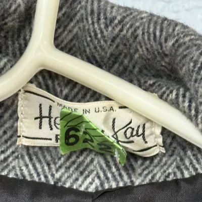 Sale Photo Thumbnail #904: Vintage Helen Kay grey tweed herringbone coat tag, made in U.S.A.