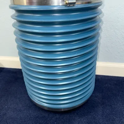 Sale Photo Thumbnail #544: Collapsible blue plastic trash container or storage canister with a metal hose clamp securing the black lid.