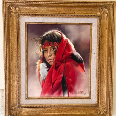 Sale Photo Thumbnail #159: Framed original portrait painting depicting a Native American girl wrapped in a red blanket, signed by the artist Hoebel in the lower right, set in an ornate gilded frame with a linen liner.