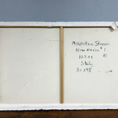 Sale Photo Thumbnail #478: Back of a stretched canvas painting titled "Mountain Stream New Mexico #1" by Staley, dated October 7, 2001, measuring 30 by 48 inches.