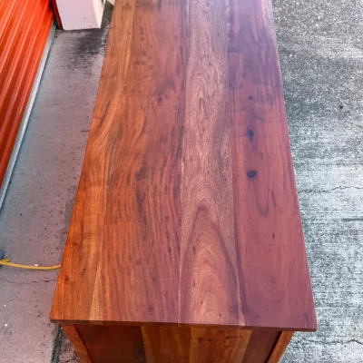 Sale Photo Thumbnail #315: Solid rich-toned hardwood storage chest or console table featuring prominent natural wood grain and a smooth finished top.