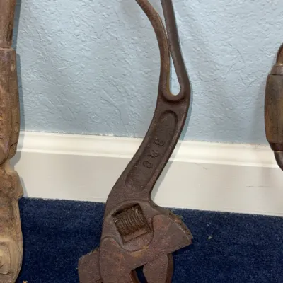 Sale Photo Thumbnail #563: Antique Bemis & Call S-handle adjustable wrench featuring a cast-iron body with heavy surface patina.