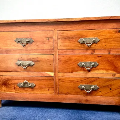 Sale Photo Thumbnail #243: Rustic solid wood six-drawer dresser featuring a warm finish and ornate metallic bail pull handles.