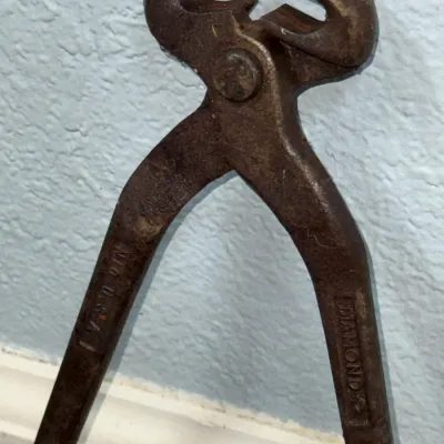 Sale Photo Thumbnail #578: Vintage Diamond brand wrought steel end-cutting pliers with a heavily aged patina.