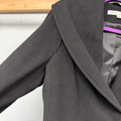 Sale Photo Thumbnail #860: Larry Levine black wool-blend coat featuring a dramatic shawl collar and fully lined interior, size 12.