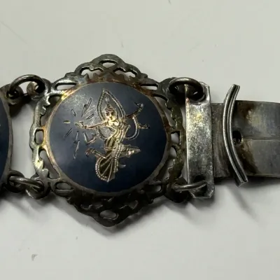 Sale Photo Thumbnail #166: Vintage Siam sterling silver niello panel bracelet featuring detailed depictions of Mekkala, Goddess of Lightning.