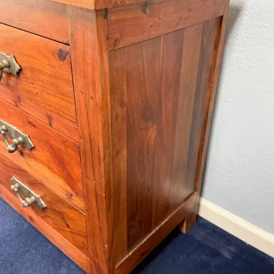Sale Photo Thumbnail #246: Rustic solid wood dresser featuring ornate metal drawer pulls and panel sides.