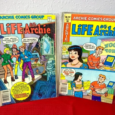 Sale Photo Thumbnail #755: Two bagged vintage Life with Archie comic books, issues #203 and #207, featuring colorful Bronze Age cover art.