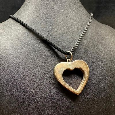 Sale Photo Thumbnail #495: Sterling Silver Heart Pendant on String Necklace