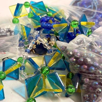 Over a Pound of Blue Toned Charms, Beads, Broken Costume Jewelry and More