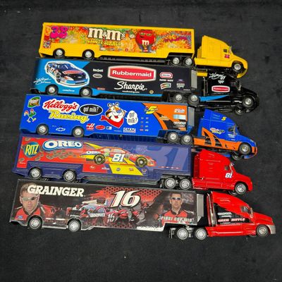 Sale Photo Thumbnail #402: NASCAR Die-Cast Transporter Trucks MandMs Rubbermaid Kelloggs Oreo and Grainger