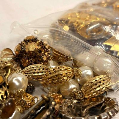 10 Plus Ounces of Gold Charms, Beads, Broken Costume Jewelry and More