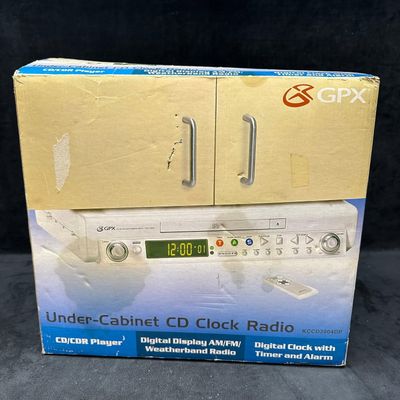 Sale Photo Thumbnail #328: GPX Under Cabinet CD Clock Radio AM FM Weatherband KCCD3004DP In Box