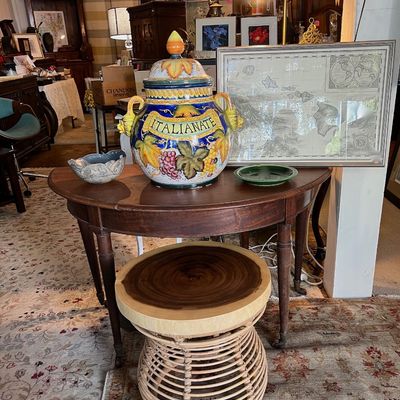 Wood and rattan ottoman or side table.