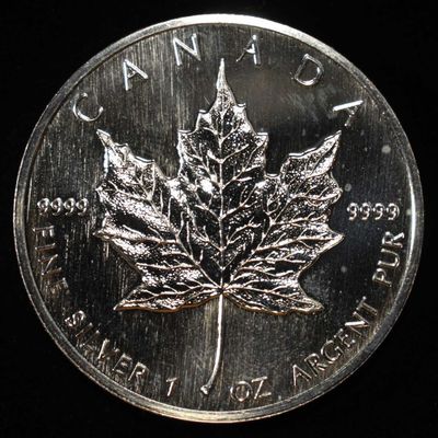 Sale Photo Thumbnail #413: 1988 MAPLE LEAF CANADIAN 1 OZ 0.9999 SILVER ROUND
