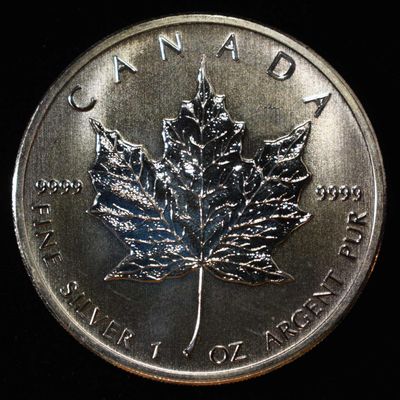 Sale Photo Thumbnail #414: 2011 MAPLE LEAF 1 OZ 0.9999 SILVER ROUND
