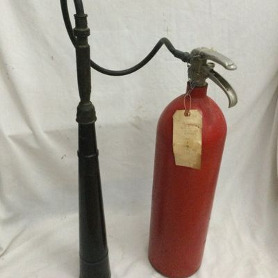 Sale Photo Thumbnail #157: Vintage red carbon dioxide fire extinguisher from
