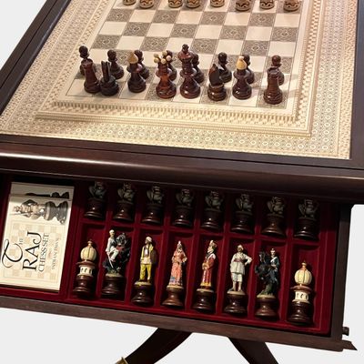 A Collection of Two Complete Chess Sets with Integrated Wooden Pedestal Storage Table