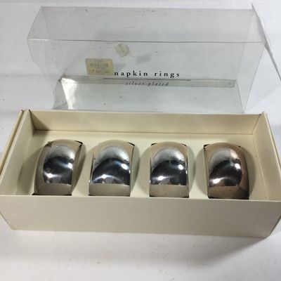 Sale Photo Thumbnail #154: Four silver plated napkin rings