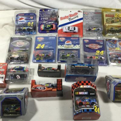 Sale Photo Thumbnail #328: 20 Diecast race cars all in sealed packages