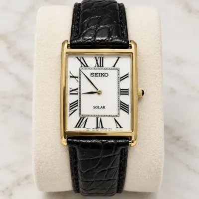 Seiko Solar Gold-Tone Rectangular Dress Watch with Roman Numeral Dial & Black Leather Strap
