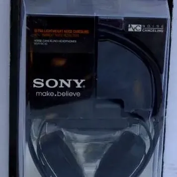 Vintage Sony ultra-lightweight noise-canceling headphones, model MDR-NC10, sealed in original clamshell packaging.