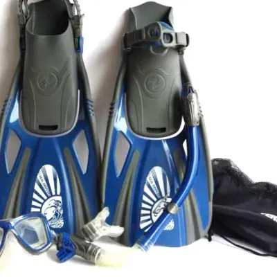 U.S. Divers snorkeling set featuring blue and gray adjustable fins, a matching mask, snorkel, and a mesh storage bag.